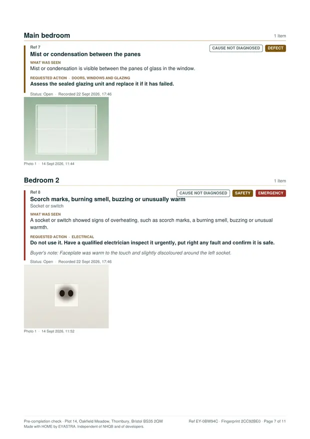 A findings page showing an item flagged as both an emergency and a safety issue, an overheating socket, with a photograph